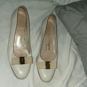 well worn ferragamo flats